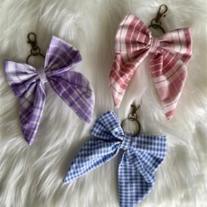 bow keychains on fur